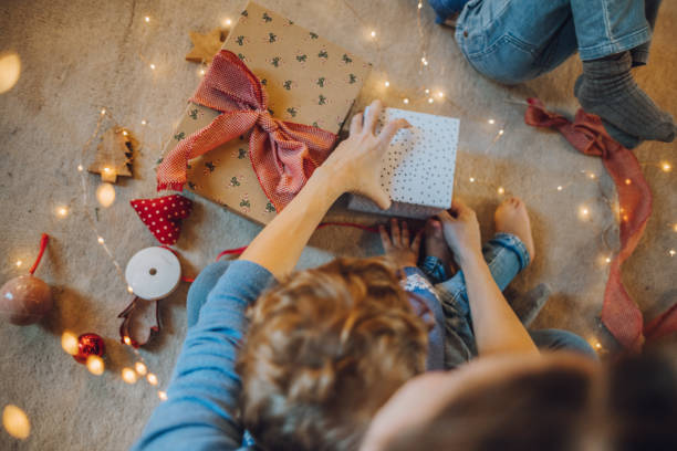 istock Woman wrapping gifts 1066670938