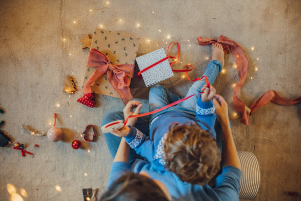 istock Woman wrapping gifts 1066671020
