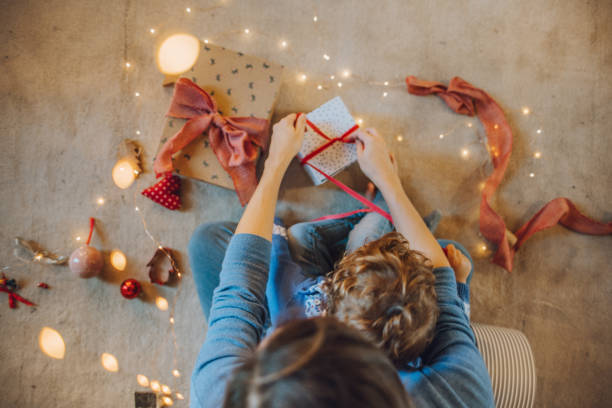 istock Woman wrapping gifts 1066672156