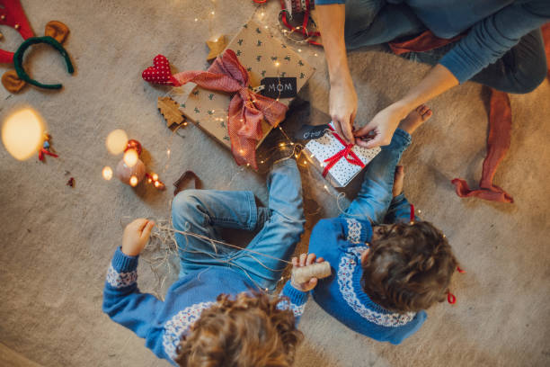 istock Kids wrapping christmas gifts 1066672504