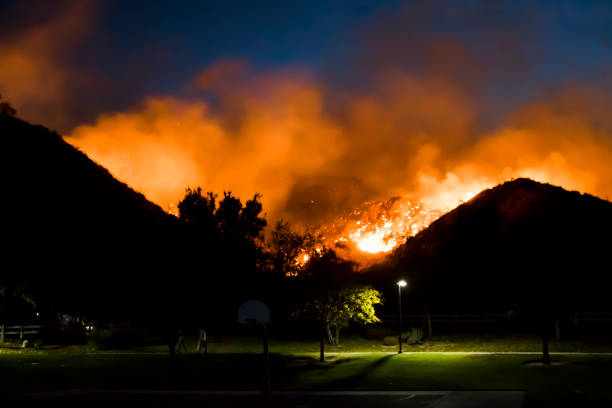 Fire Burns in Hills at Neighborhood Park during California Fire stock photo