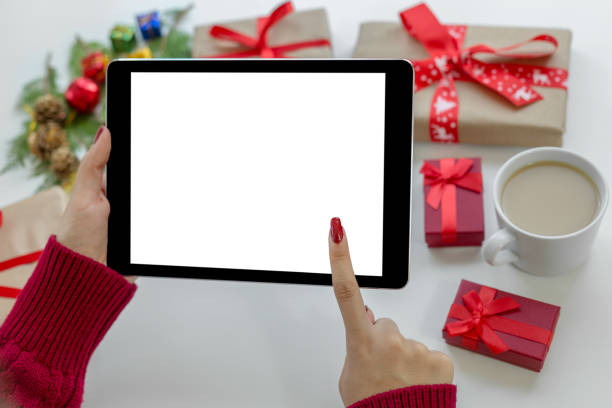 istock Christmas shopping with tablet 1066675824