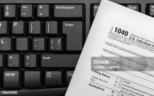 Tax Form On Black Keyboard Close Up Stock Photo - Download Image Now - Tax Form, Tax, Computer