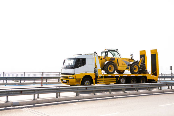 istock Truck Carrying Excavator 1066680394