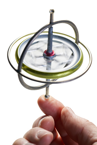 Gyroscope toy that is spinning keeping balance spin concept