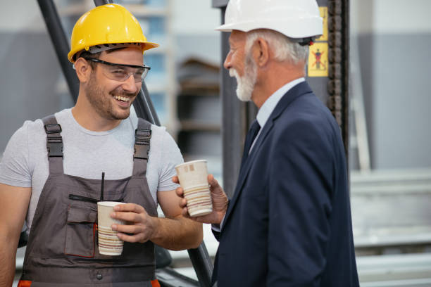 istock Factory worker and quality inspector in factory on a break 1066694914