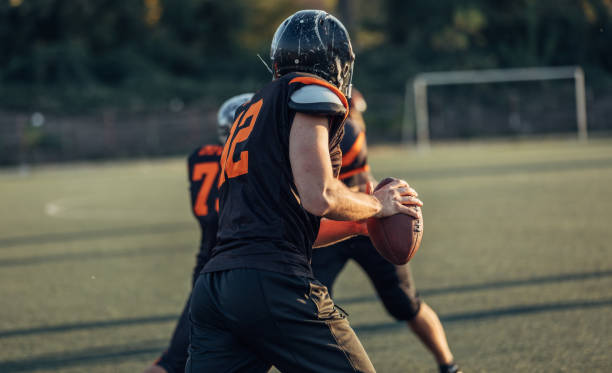istock Football Players During Game 1066705032