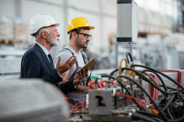 istock Engineer with quality inspector in factory 1066705496