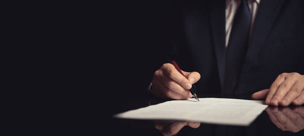 istock Lawyer, attorney signing a contract 1066710380