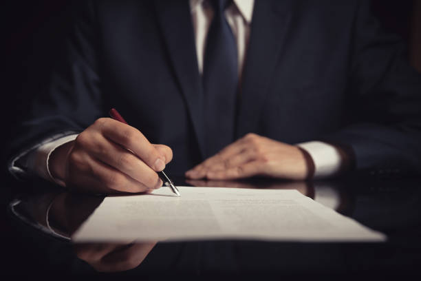 istock Lawyer, attorney signing a contract 1066710398