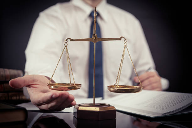 istock Weight scale of justice. Lawyer working in office 1066712044