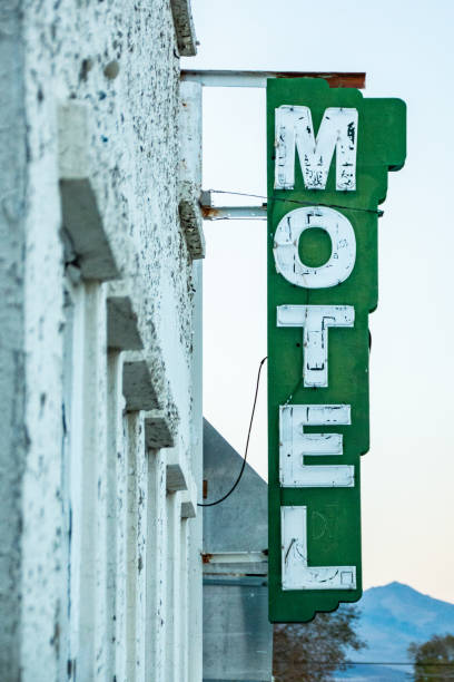 istock Motel Sign with Row of Windows 1066713624