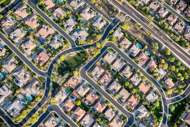 Aerial view looking directly down on homes in a planned exclusive residential community in the Scottsdale area of Arizona.