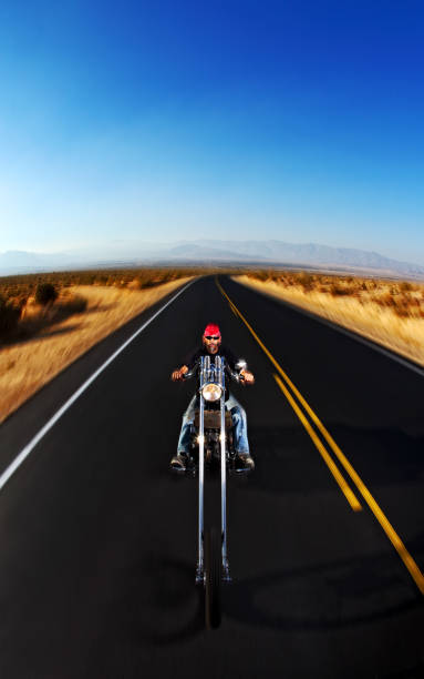 istock Biker out in the desert 1066713724