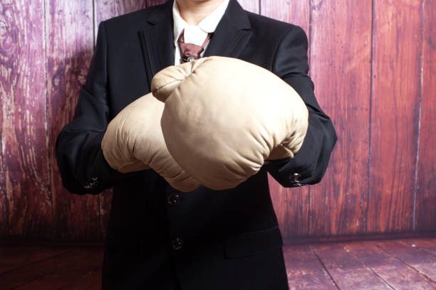 businessman in boxing gloves - anti smoking imagens e fotografias de stock