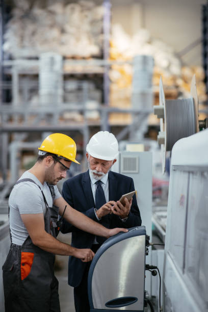 istock Engineer with quality inspector in factory 1066715402
