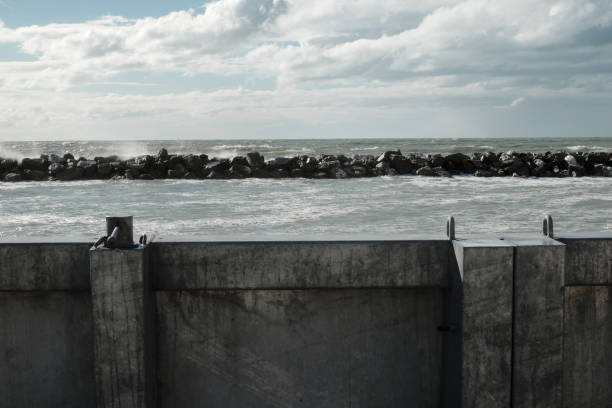 istock bulkhead and turbulent sea 1066724044