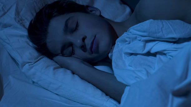 istock Handsome young man sleeping having deep healthy rest in his sofa, cozy bedding 1066730638