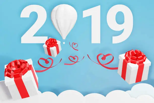 Photo of Paper art style of Happy new year 2019 and balloon scatter gift box in the sky, Create custom greeting cards given on special occasions such as Happy new year or valentine day, 3D rendering design.