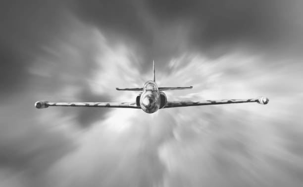 istock Military jet fighter airplane flying above the clouds 1066744990