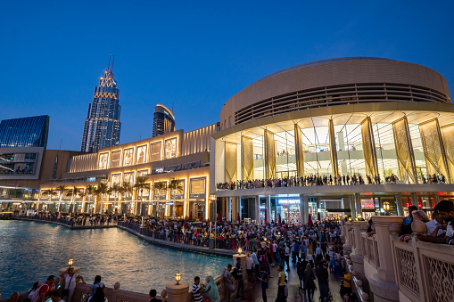 Dubai, UAE - Oct 16, 2018: People visiting the Dubai Mall. It is one of the largest mall in the world.