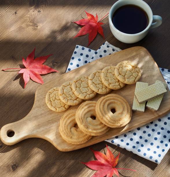 istock Butter cookies, chocolate cookies, coffee and maple leaves 1066755712