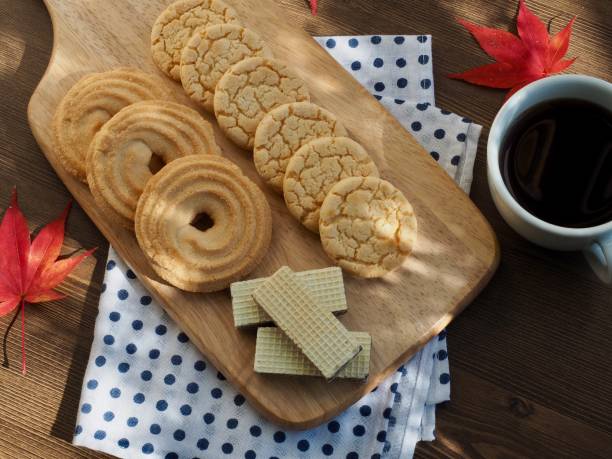 istock Butter cookies, chocolate cookies, coffee and maple leaves 1066755716