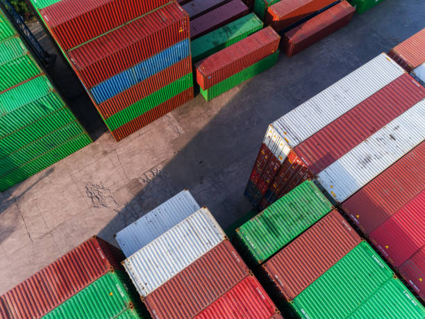 istock Aerial view  container at  sea port warehouse for load to container ship for logistics import  export or transportation concept background. 1066762810