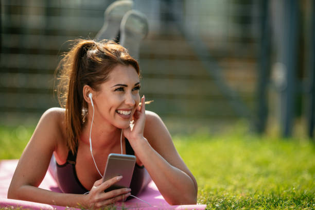 istock Young woman exercising outdoors 1066766584