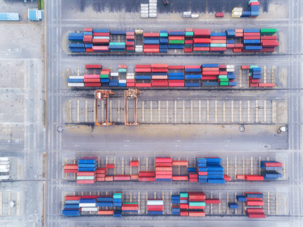 istock Aerial view container ship sea port and working crane bridge for loading container for import  export or transportation concept background. 1066766862