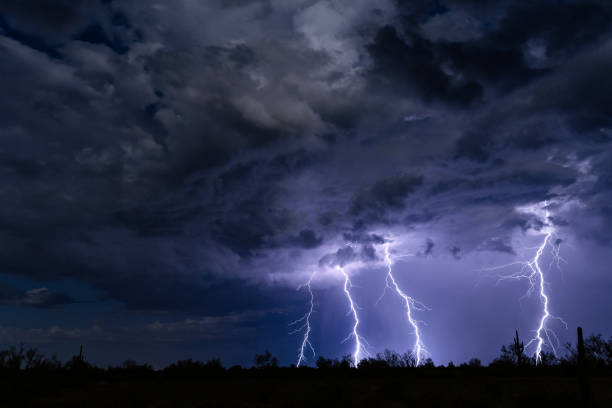 istock Lightning bolts strike in a storm. 1066766938