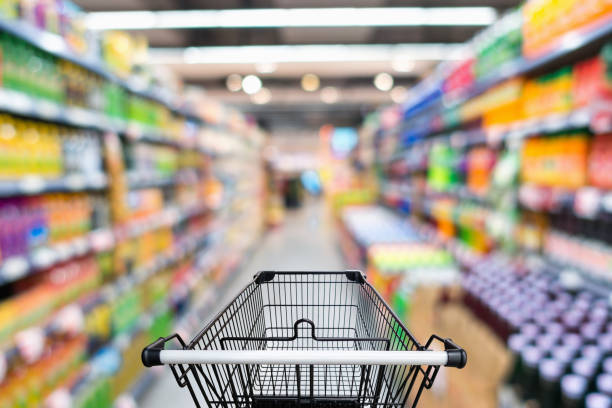 istock Shopping trolley in supermarket store 1066767462