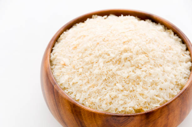 istock breadcrumbs in round wooden bowl 1066780150