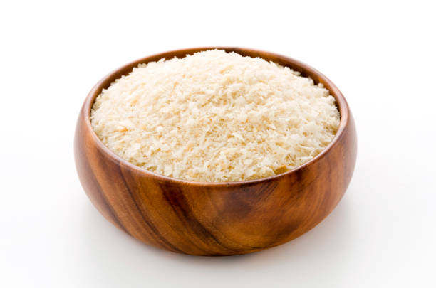 istock breadcrumbs in round wooden bowl 1066780164