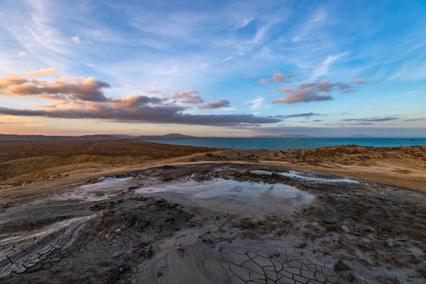 istock Mud volcanoes at sunset, beautiful amazing sky 1066792966