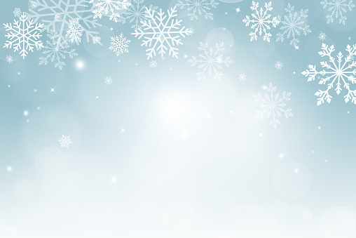 Christmas background with snowflakes and bokeh, season greetings. Abstract snowflake background