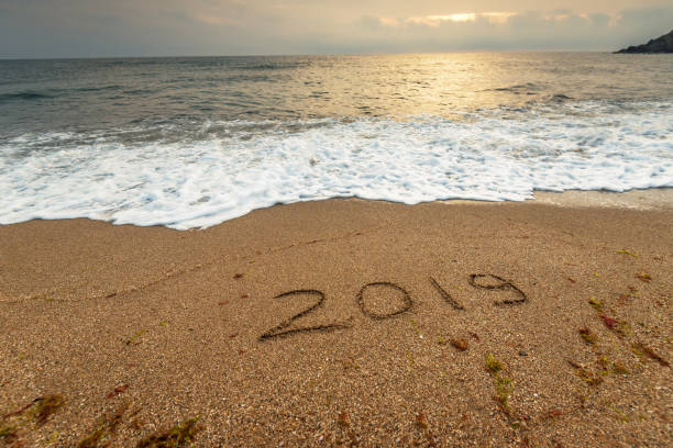 istock 2019 year on the sea shore. 1066811070