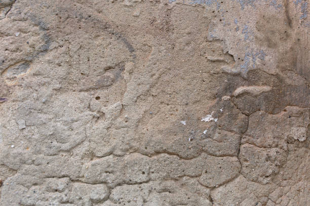 istock Grunge weathered texture. Close up old wall peeling plaster. 1066820604