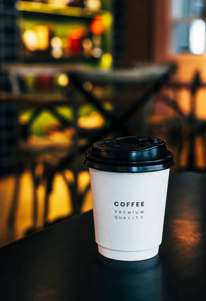 istock Disposable coffee paper cup mockup design 1066827910
