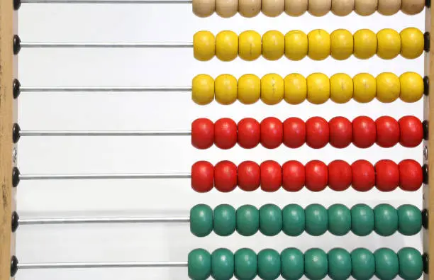 wooden abacus to count the balls and learn to do math operations