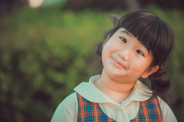 istock Little girl making a funny face 1066831396