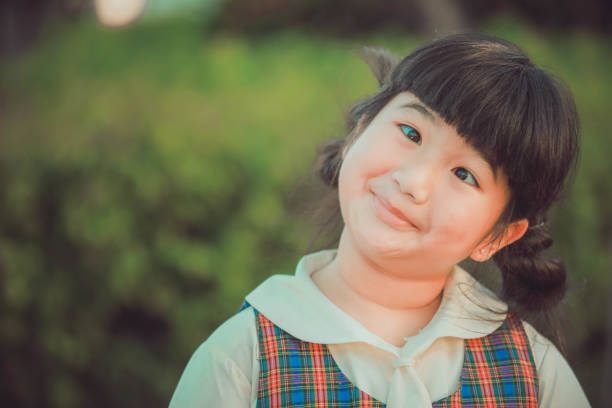 istock Little girl making a funny face 1066831522
