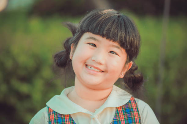 istock Little girl making a funny face 1066831536