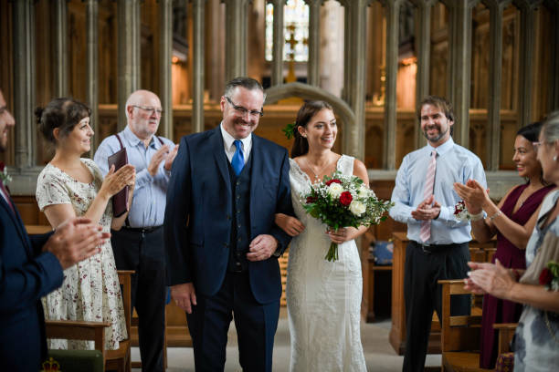 istock Flower girl walking down the aisle 1066835784