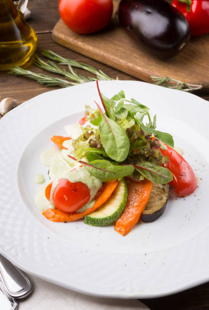 istock Grilled vegetables and herbs served for lunch 1066843192