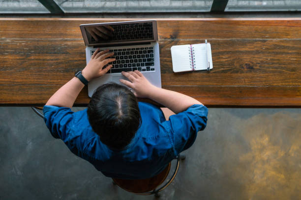 istock High angle view of freelancer working on laptop 1066845458