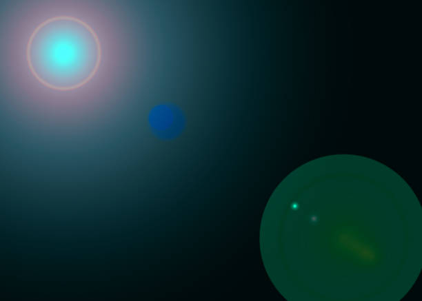 istock lens fare effect on green and black  blur background 1066849752