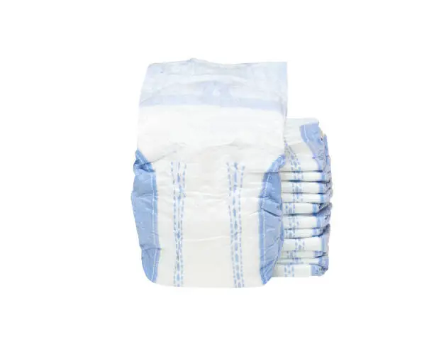 Photo of stack of baby diapers isolated on white background