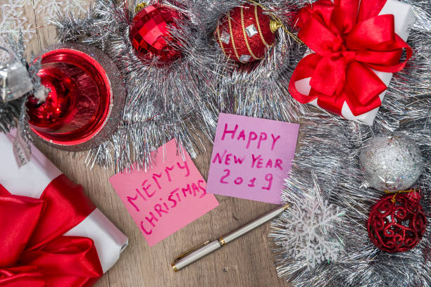 istock Top view of christmas presents with decorations on table 1066854888