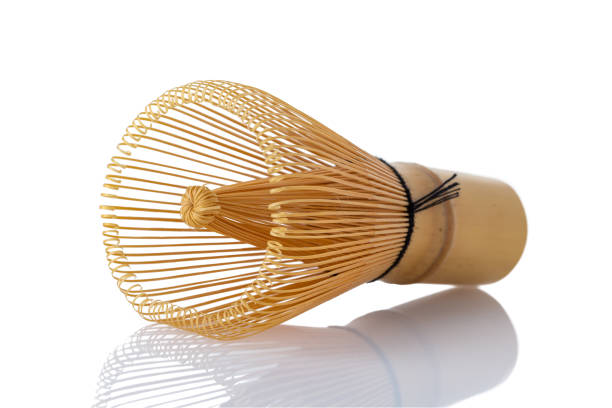 istock matcha tea bamboo whisk isolated on white 1066855092
